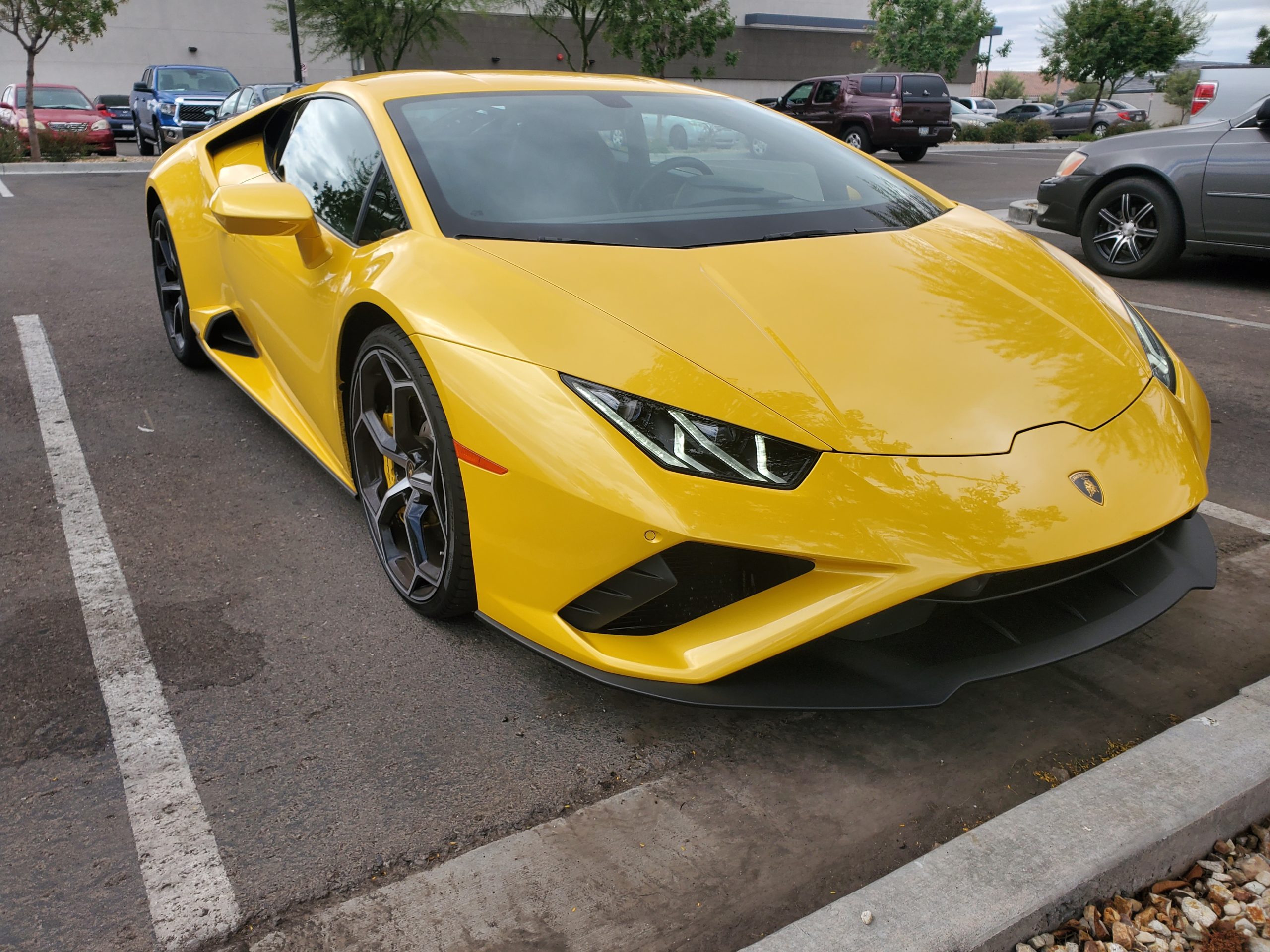 Yellow Lamborghini On A Parking Space